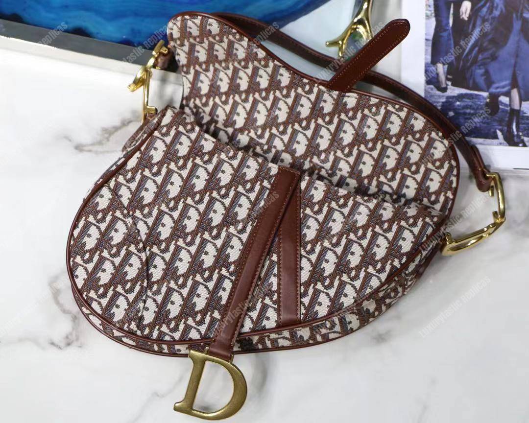 D*or burgundy oblique saddle bag