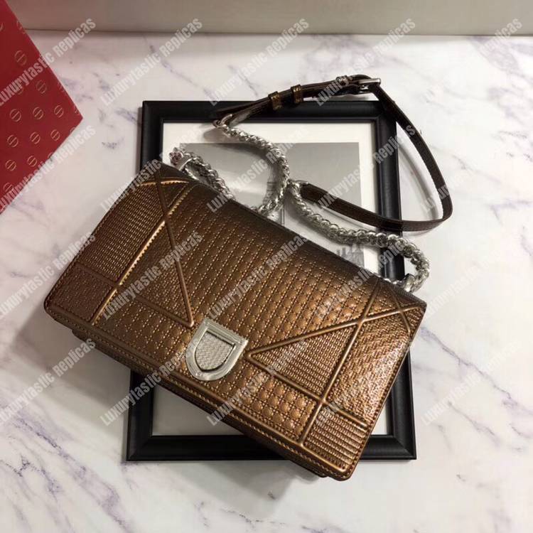 D*orama dark gold-toned metallic calfskin flap bag