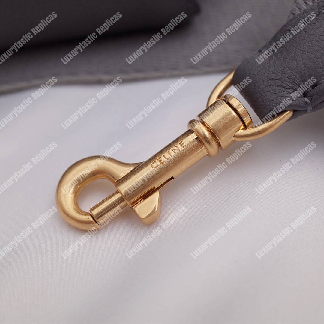 Ce**e sangle small bucket bag in soft grained calfskin grey