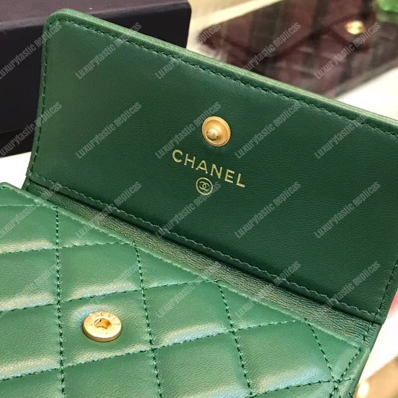 Ch*el boy small flap wallet green