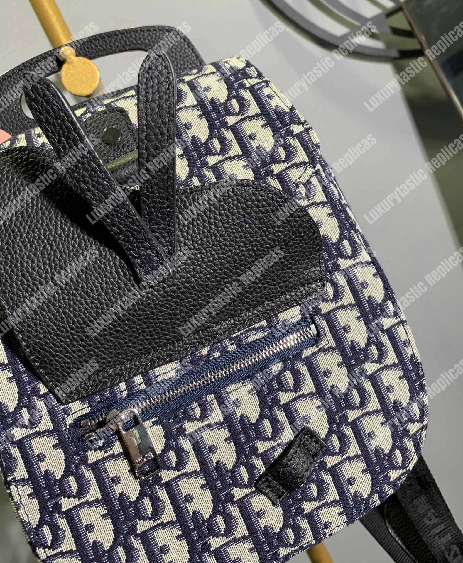 D*or navy blue oblique jacquard mini saddle backpack