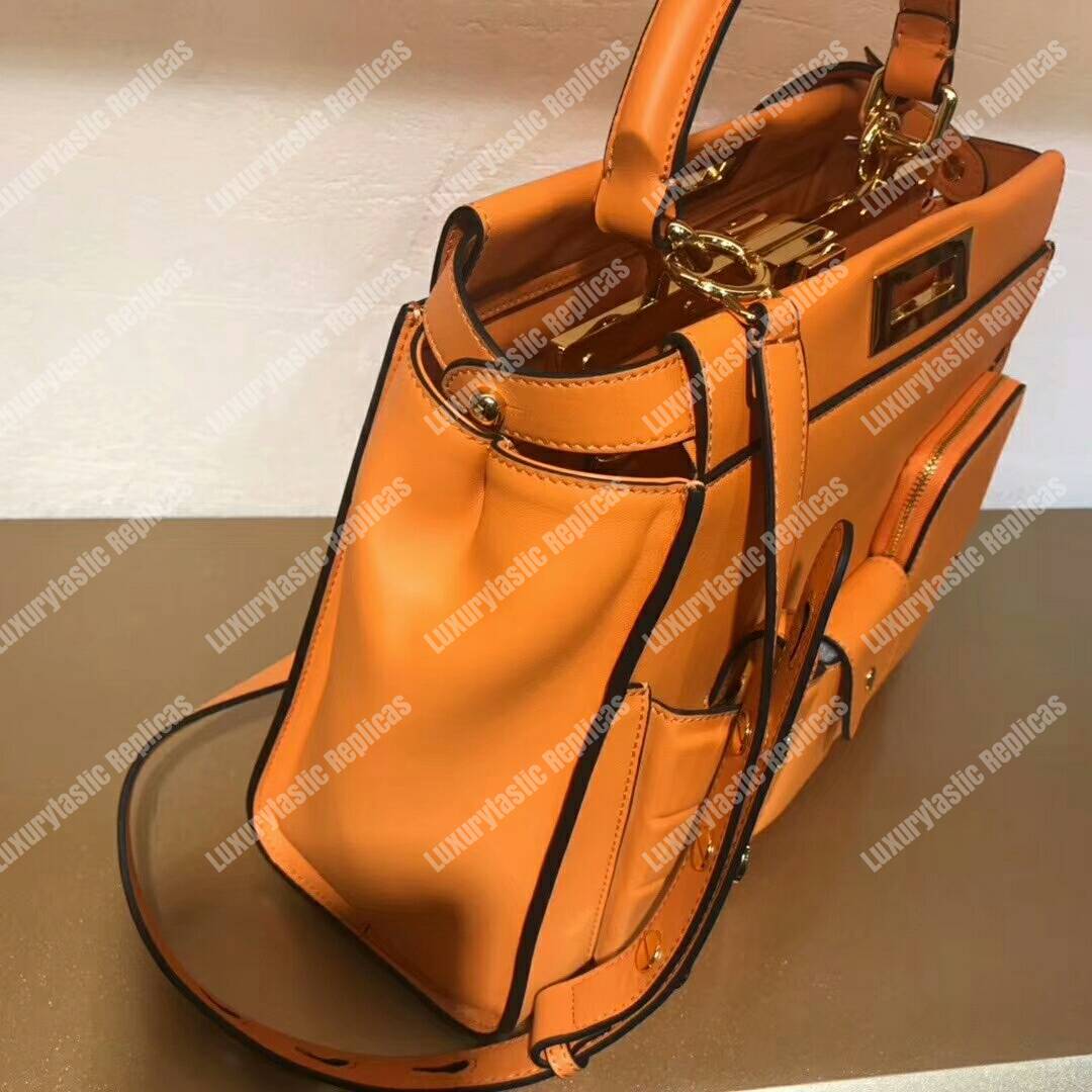 F**di peekaboo iconic medium orange leather bag