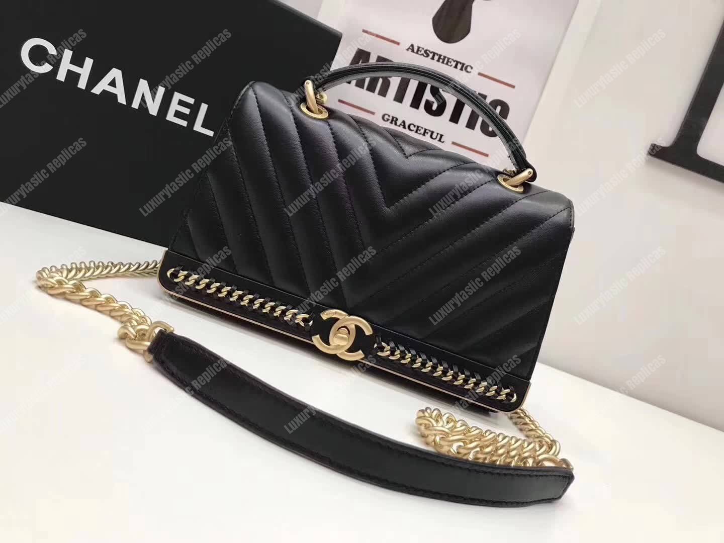 Ch*el chevron stitched chain top handle flap bag black