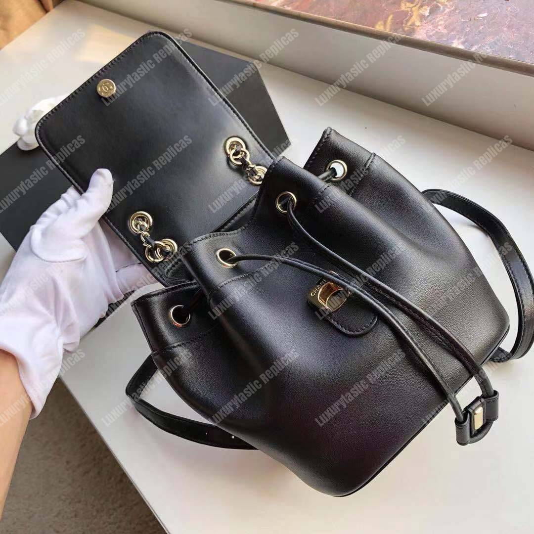 Ch*el lambskin gold-tone metal backpack black