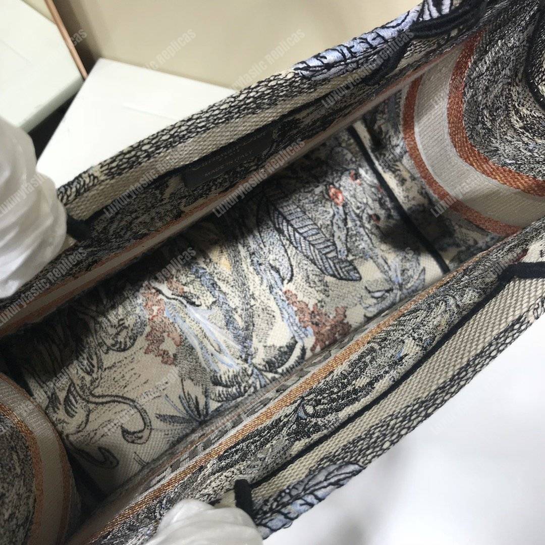 mini D*or book tote bag in embroidered canvas blue toile de jouy tropicalia