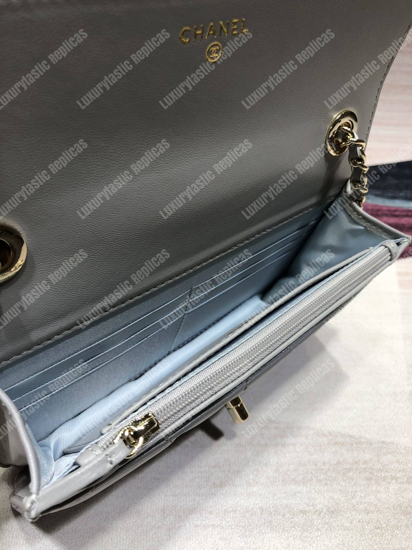 Ch*el wallet on chain – woc lambskin gold-toned metal white