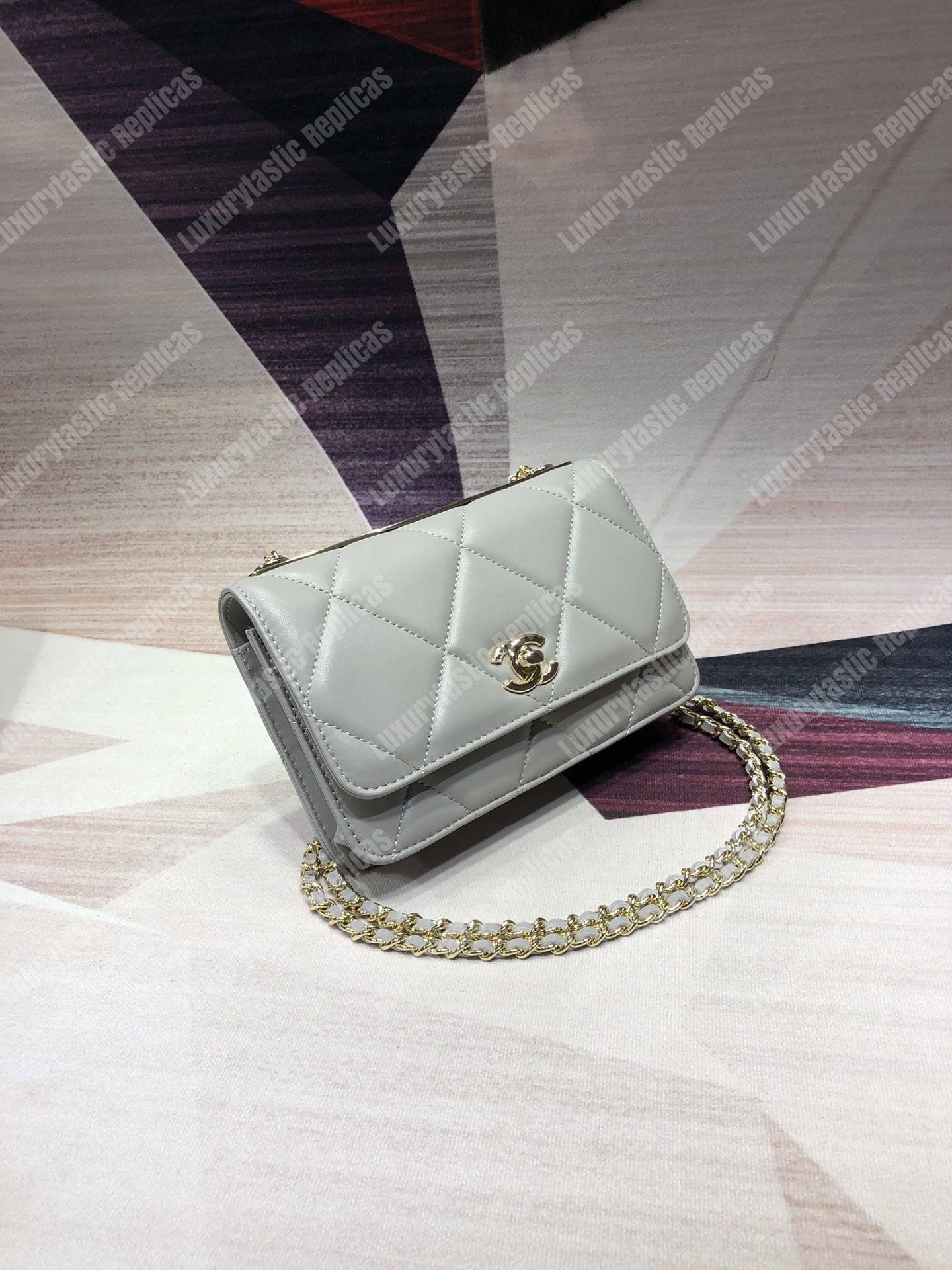 Ch*el wallet on chain – woc lambskin gold-toned metal white