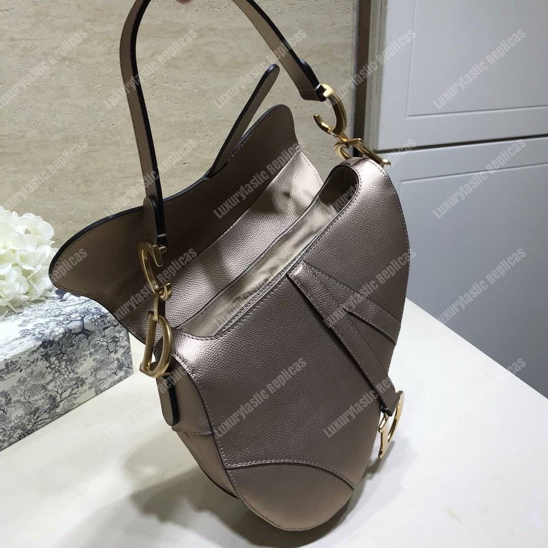 D*or saddle bag in champagne metallic grained calfskin
