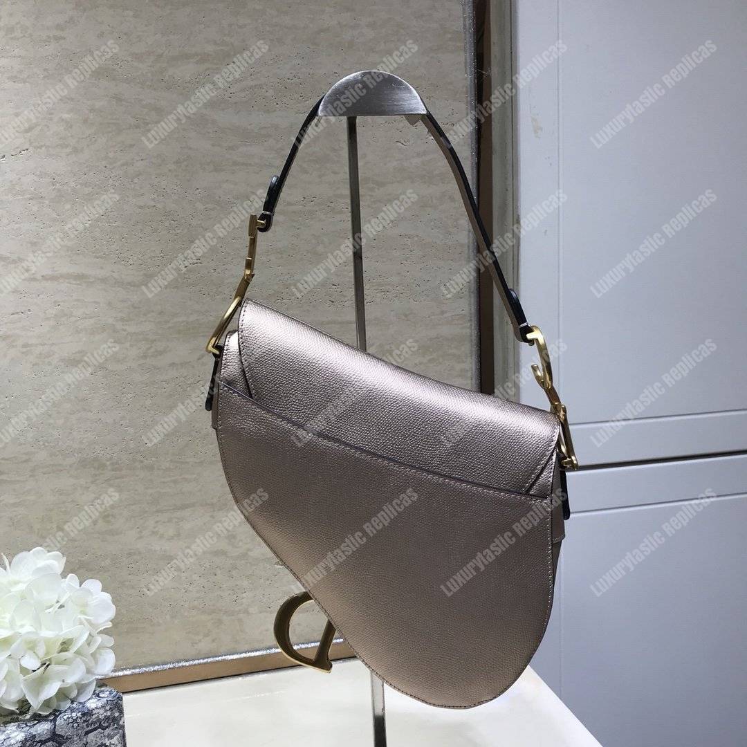 D*or saddle bag in champagne metallic grained calfskin