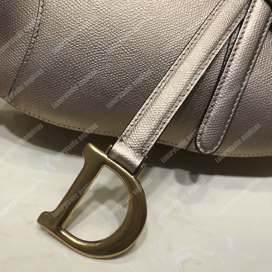 D*or saddle bag in champagne metallic grained calfskin