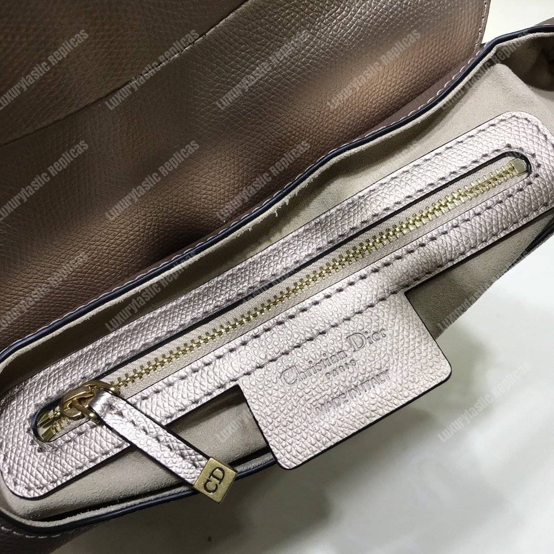 D*or saddle bag in champagne metallic grained calfskin