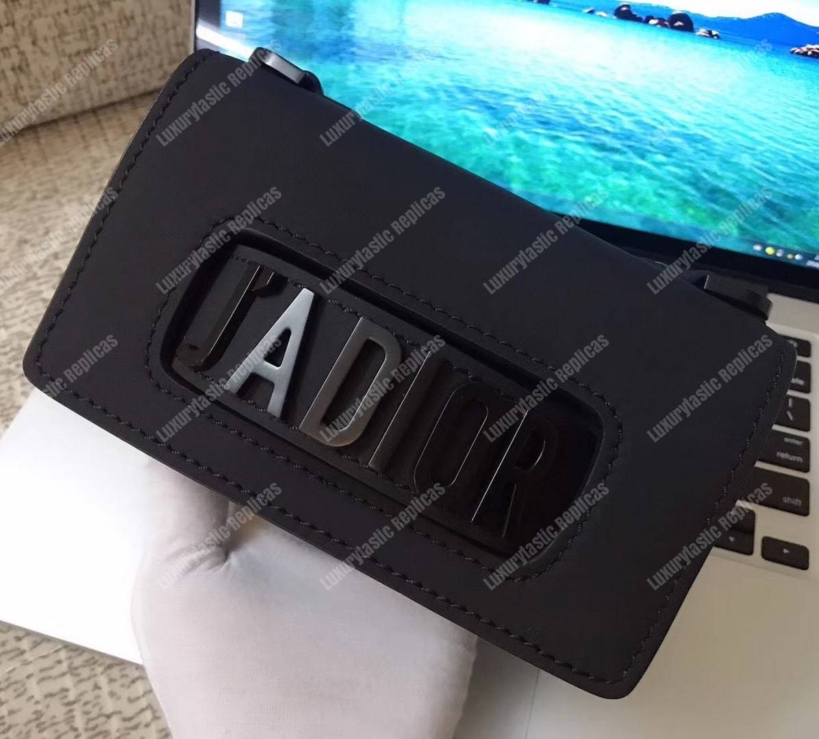 mini j’aD*or flap bag – black calfskin