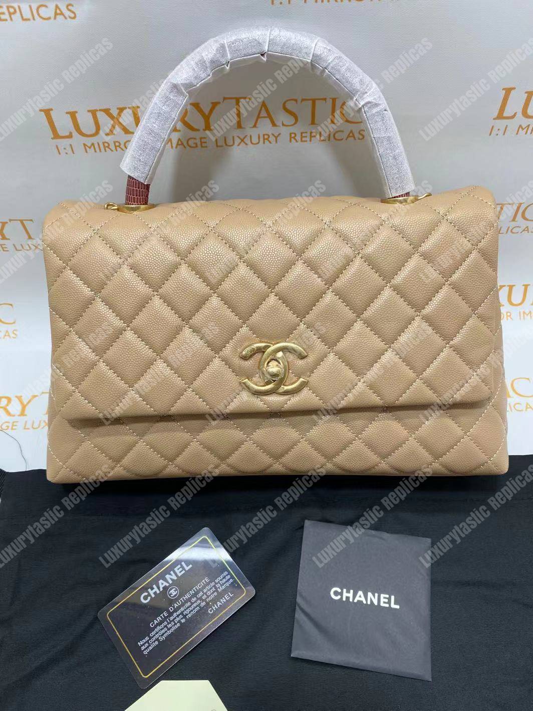 Ch*el flap bag with top handle beige