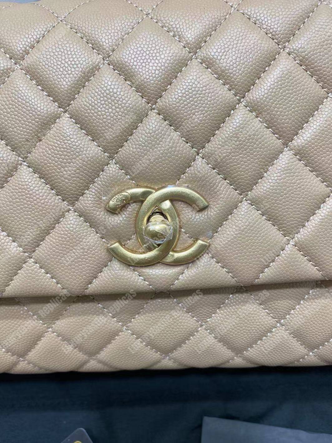 Ch*el flap bag with top handle beige