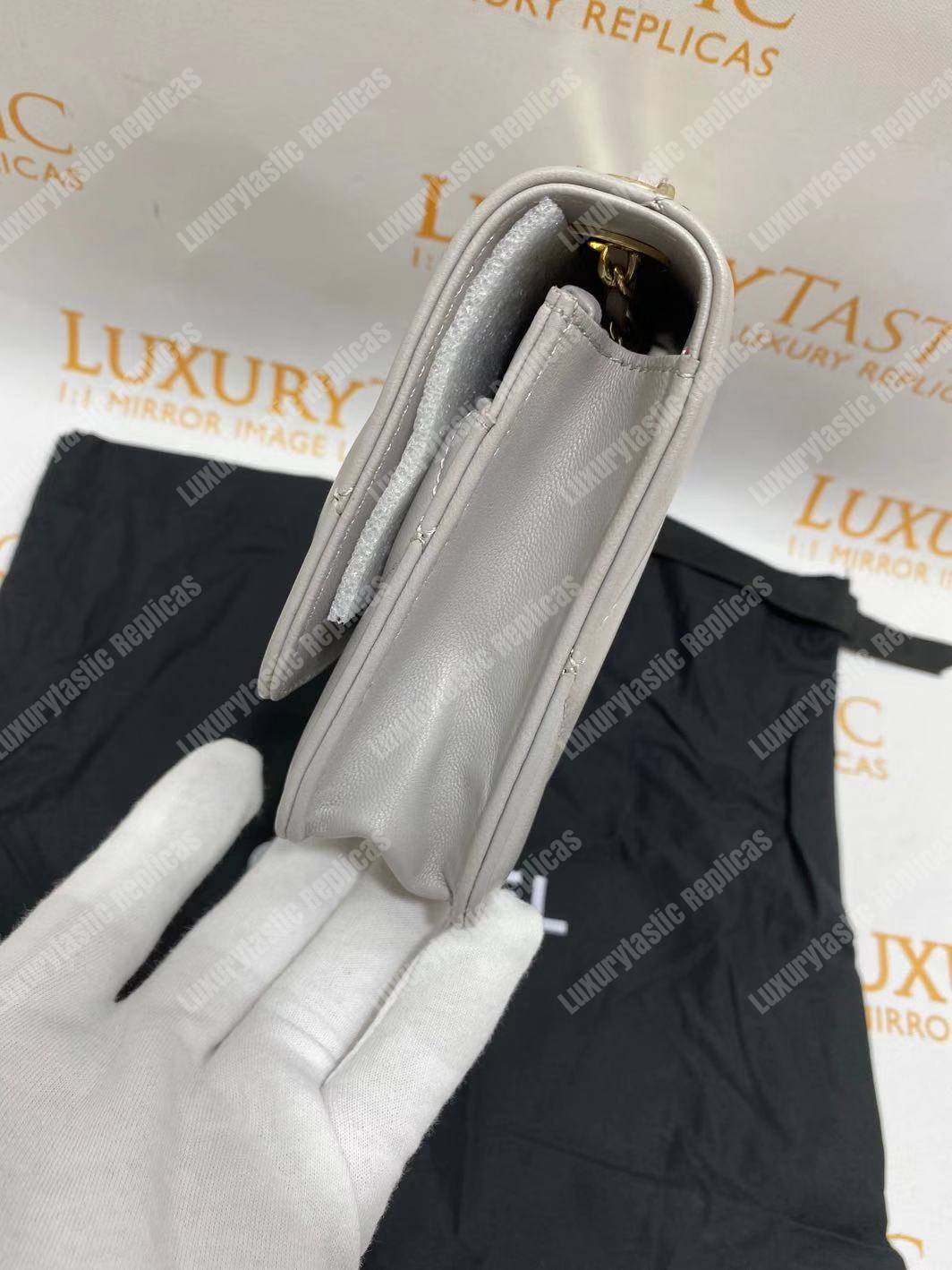 Ch*el wallet on chain – woc lambskin gold-toned metal white