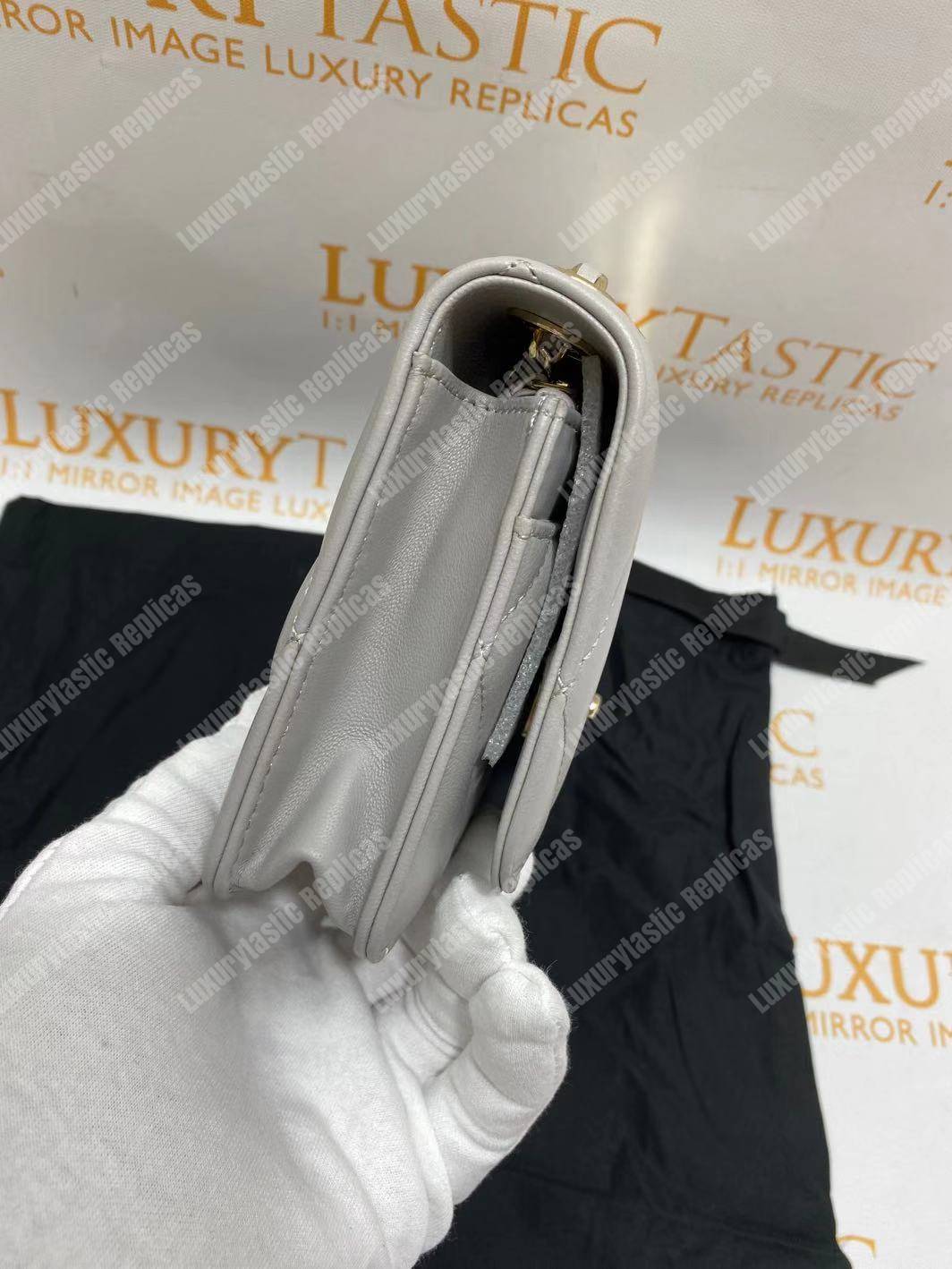 Ch*el wallet on chain – woc lambskin gold-toned metal white