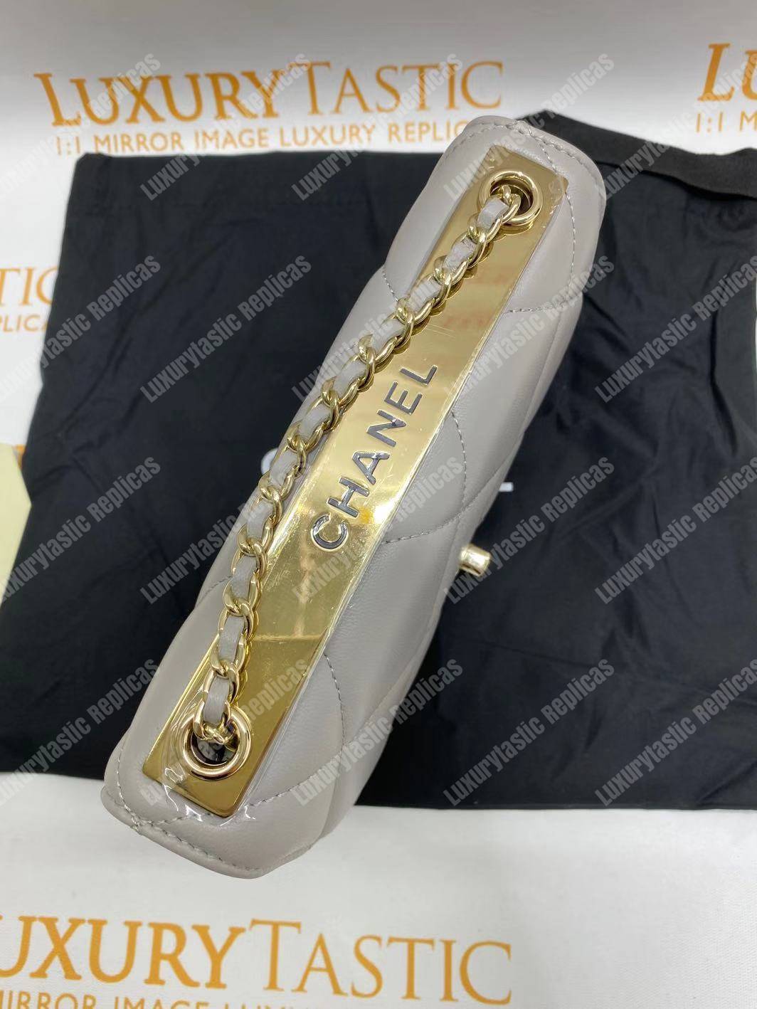 Ch*el wallet on chain – woc lambskin gold-toned metal white