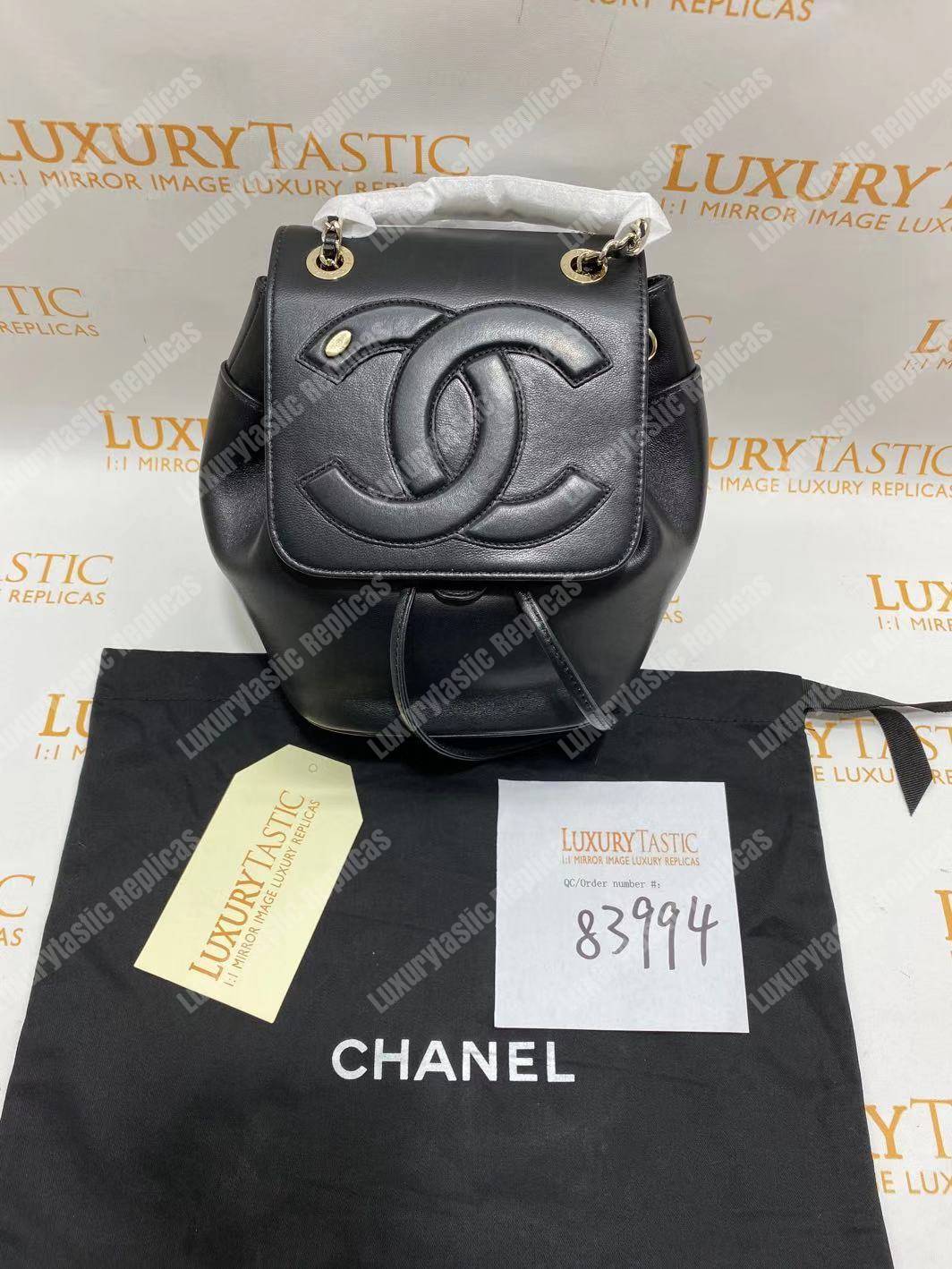 Ch*el lambskin gold-tone metal backpack black