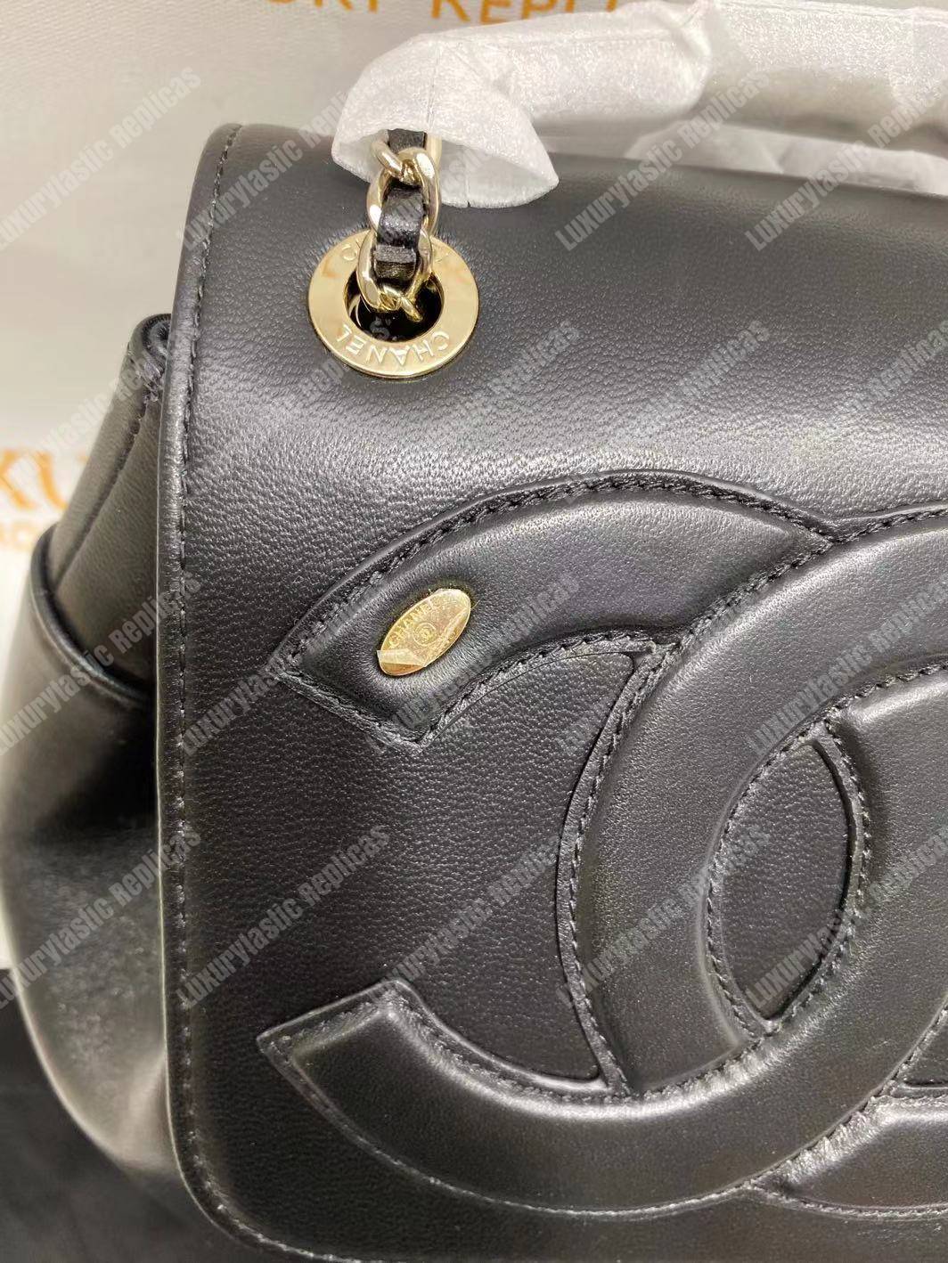 Ch*el lambskin gold-tone metal backpack black