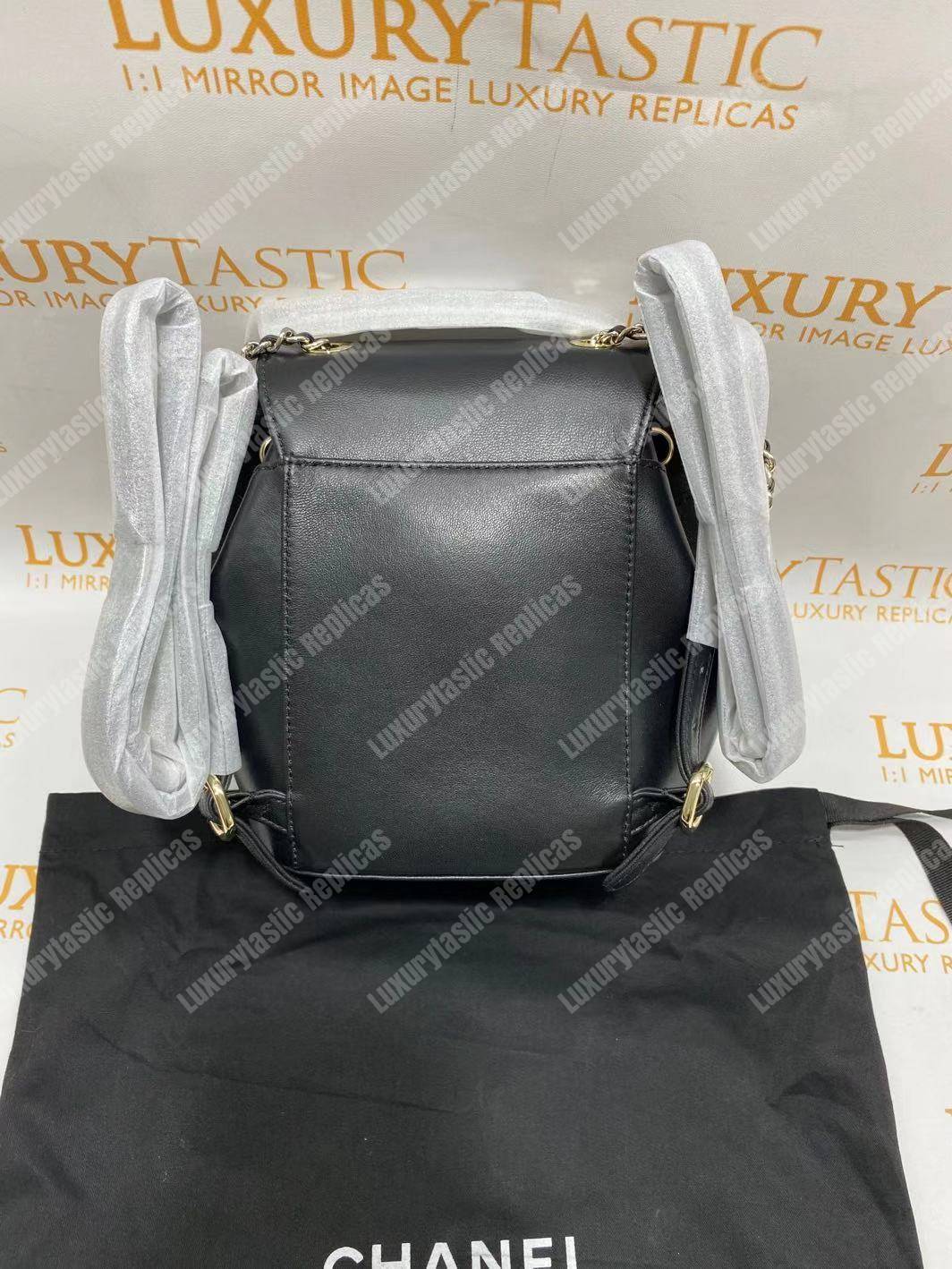 Ch*el lambskin gold-tone metal backpack black