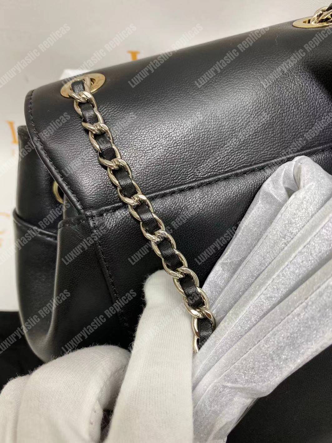 Ch*el lambskin gold-tone metal backpack black