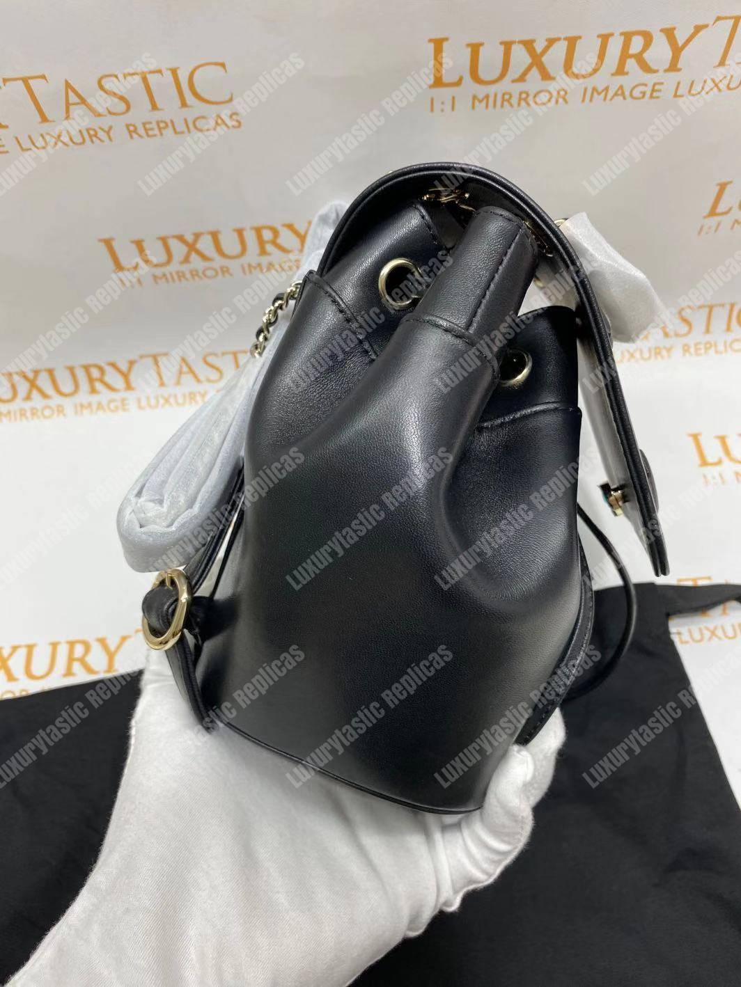 Ch*el lambskin gold-tone metal backpack black