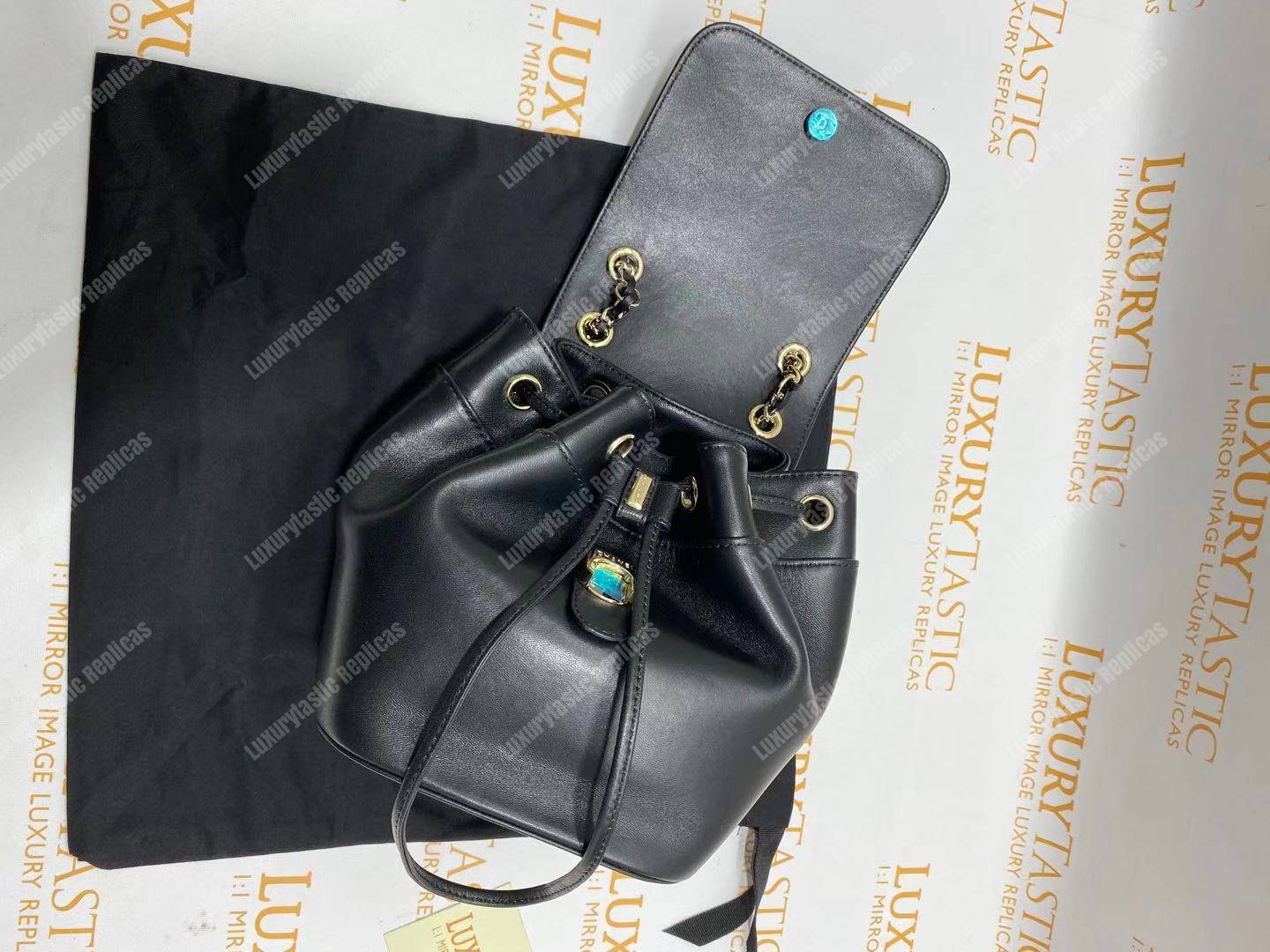 Ch*el lambskin gold-tone metal backpack black