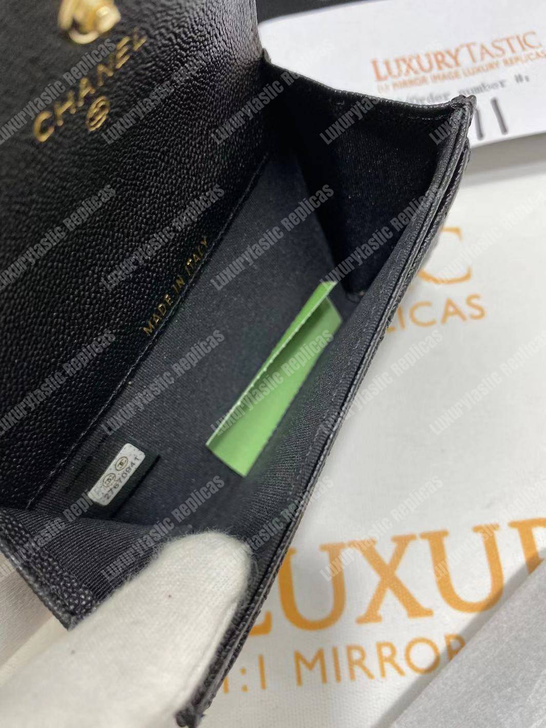 Ch*el boy small flap wallet black