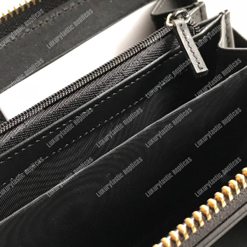 G*u*i leather zip around wallet with G*u*i logo