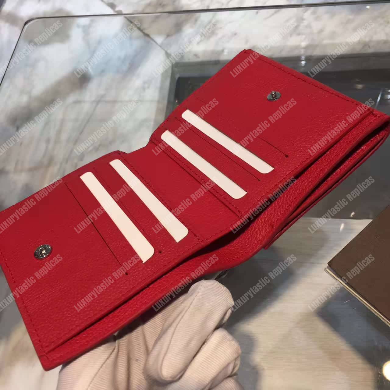LV LockMe II Compact Wallet Taurillon Leather Rubis