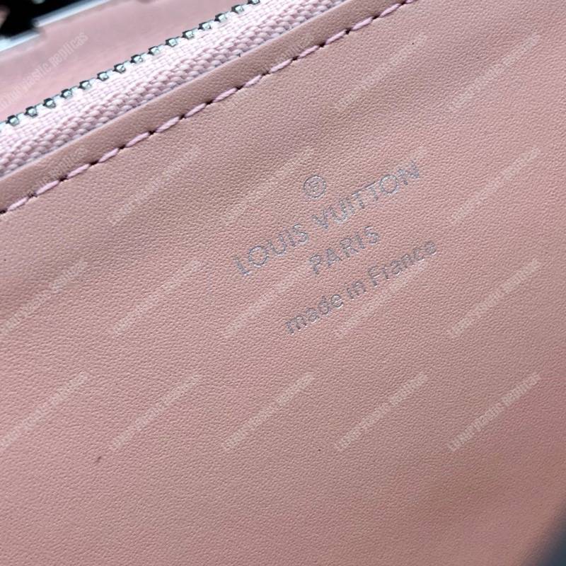 LV Capucines Wallet Taurillon Magnolia