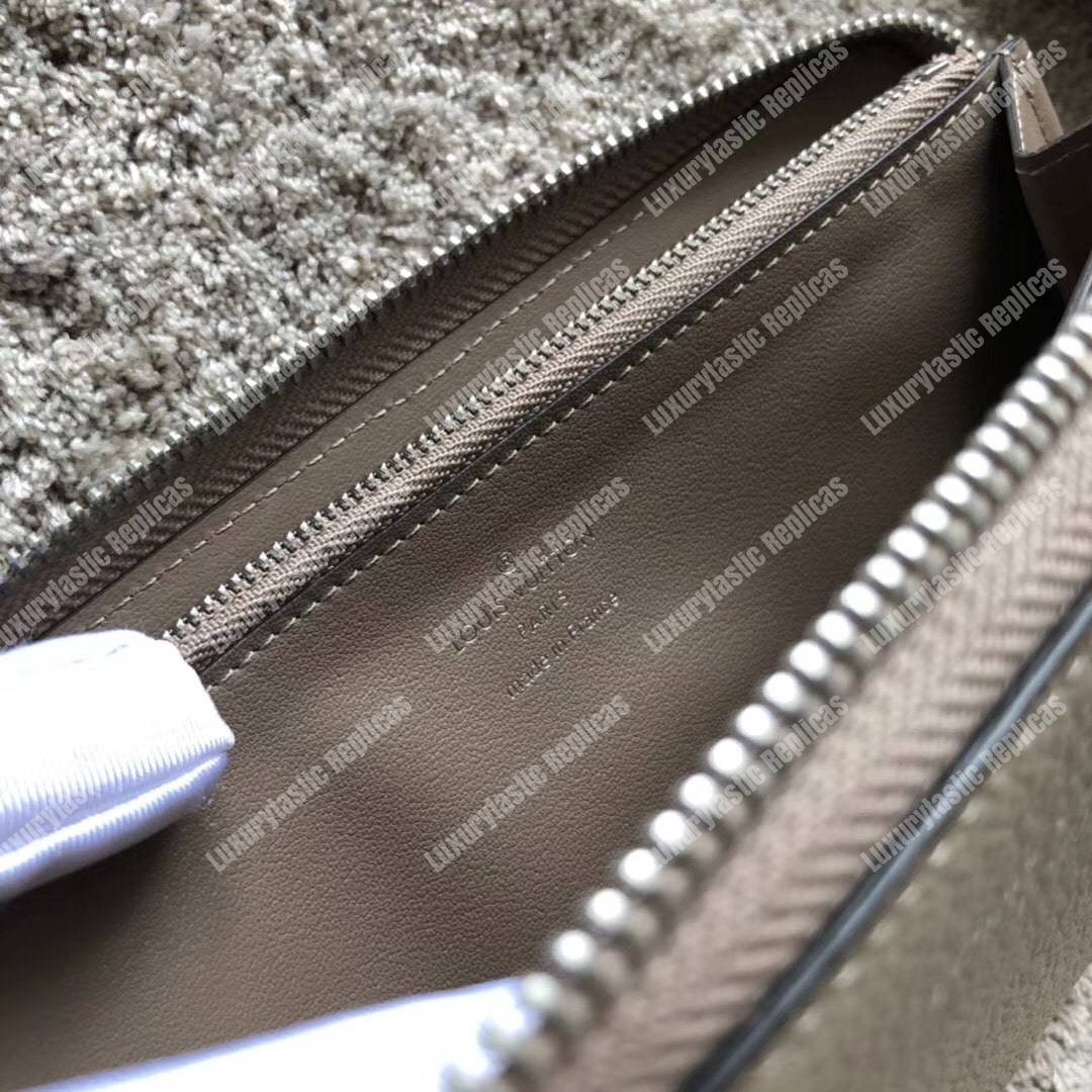 LV Comete Wallet Autres Cuirs Galet