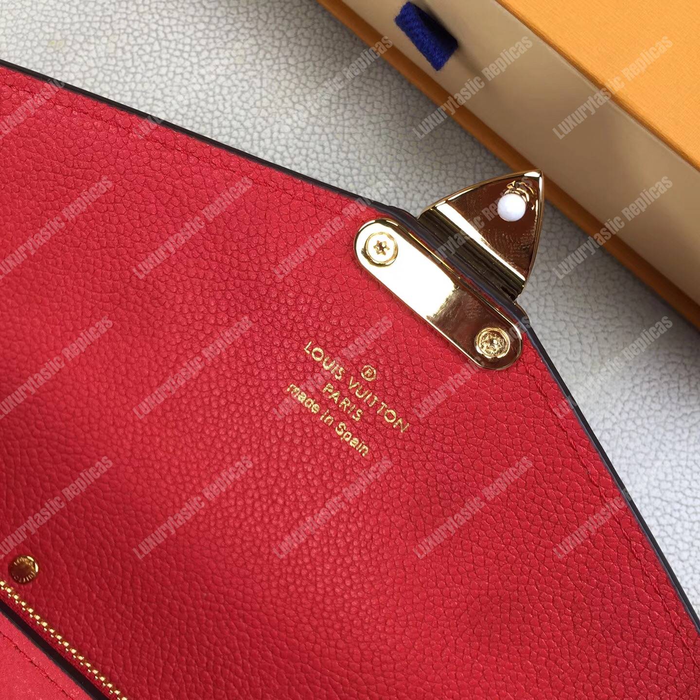 LV Metis Wallet Monogram Empreinte Leather Scarlet