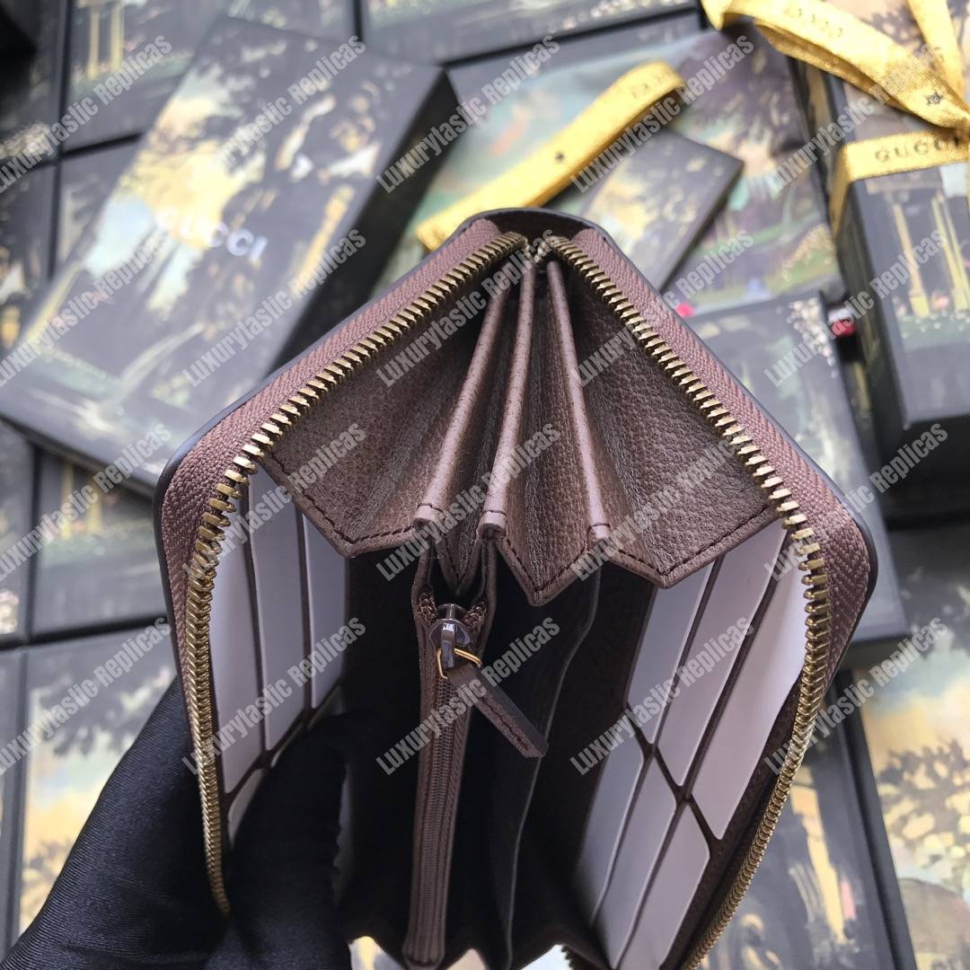 G*u*i chevron sup*e zip around leather wallet brown