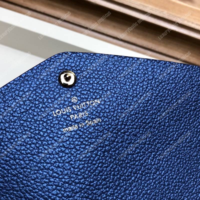 LV Sarah Wallet Monogram Empreinte Leather Marine Rouge