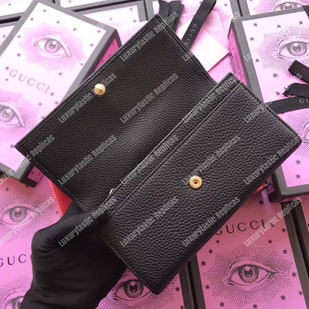 G*u*i leather wallet with bosco in black