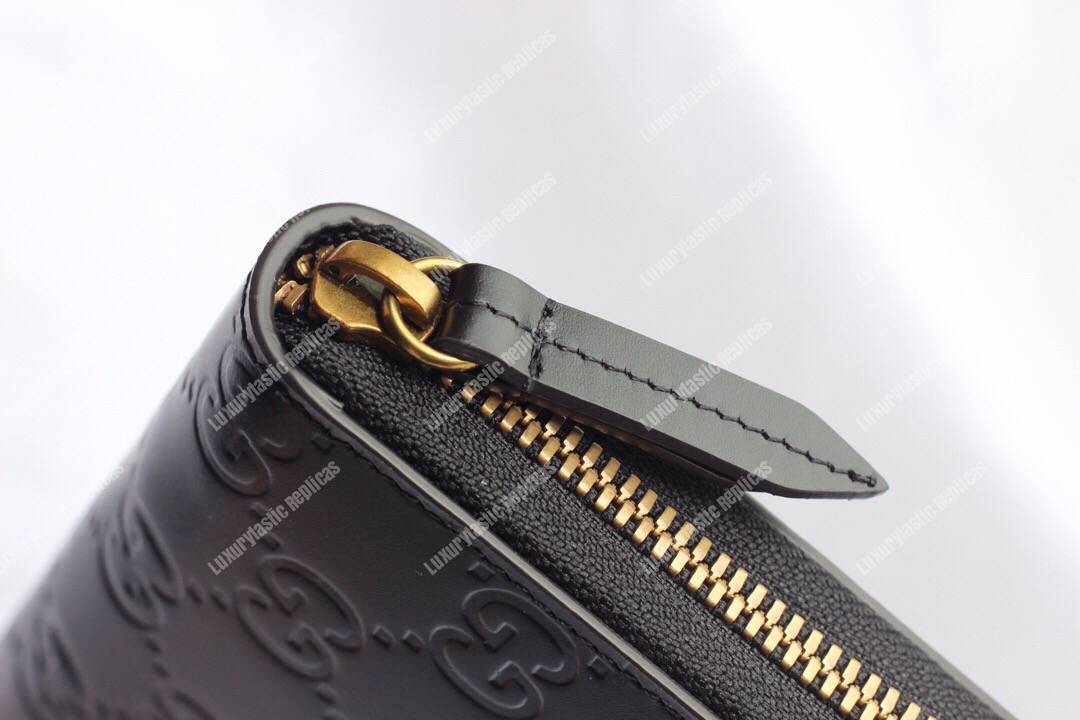 G*u*i signature zip around wallet with cat