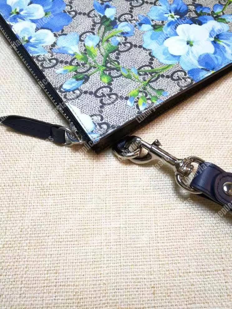 G*u*i blooms print gg sup*e clutch pouch