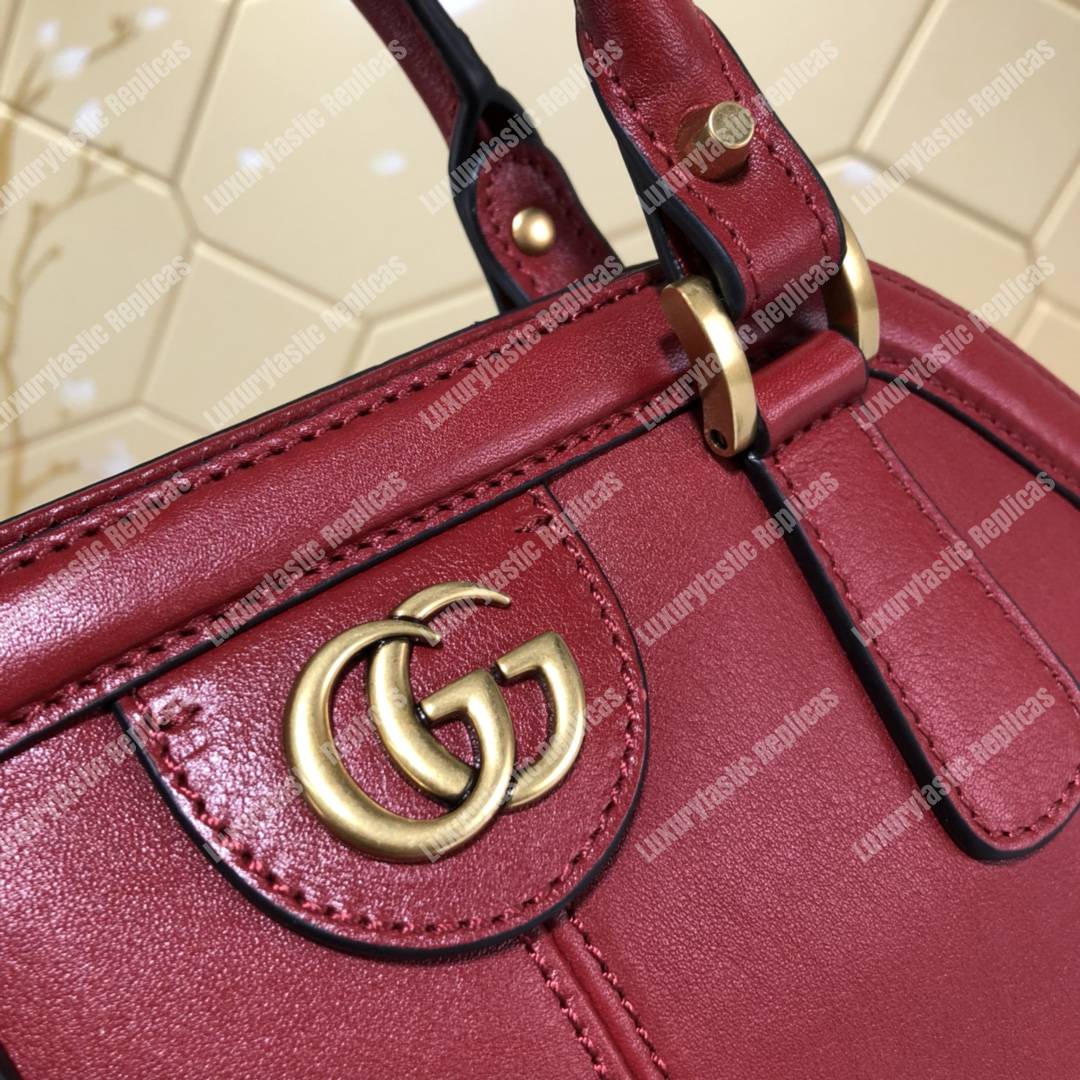 G*u*i re(belle) medium shoulder bag leather red
