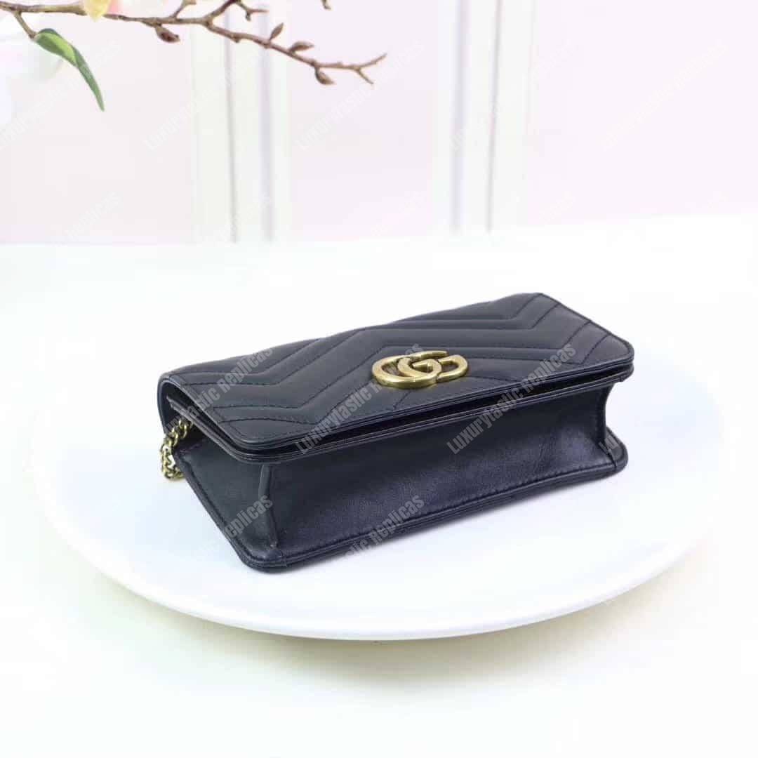 G*u*i gg marmont mini leather bag black