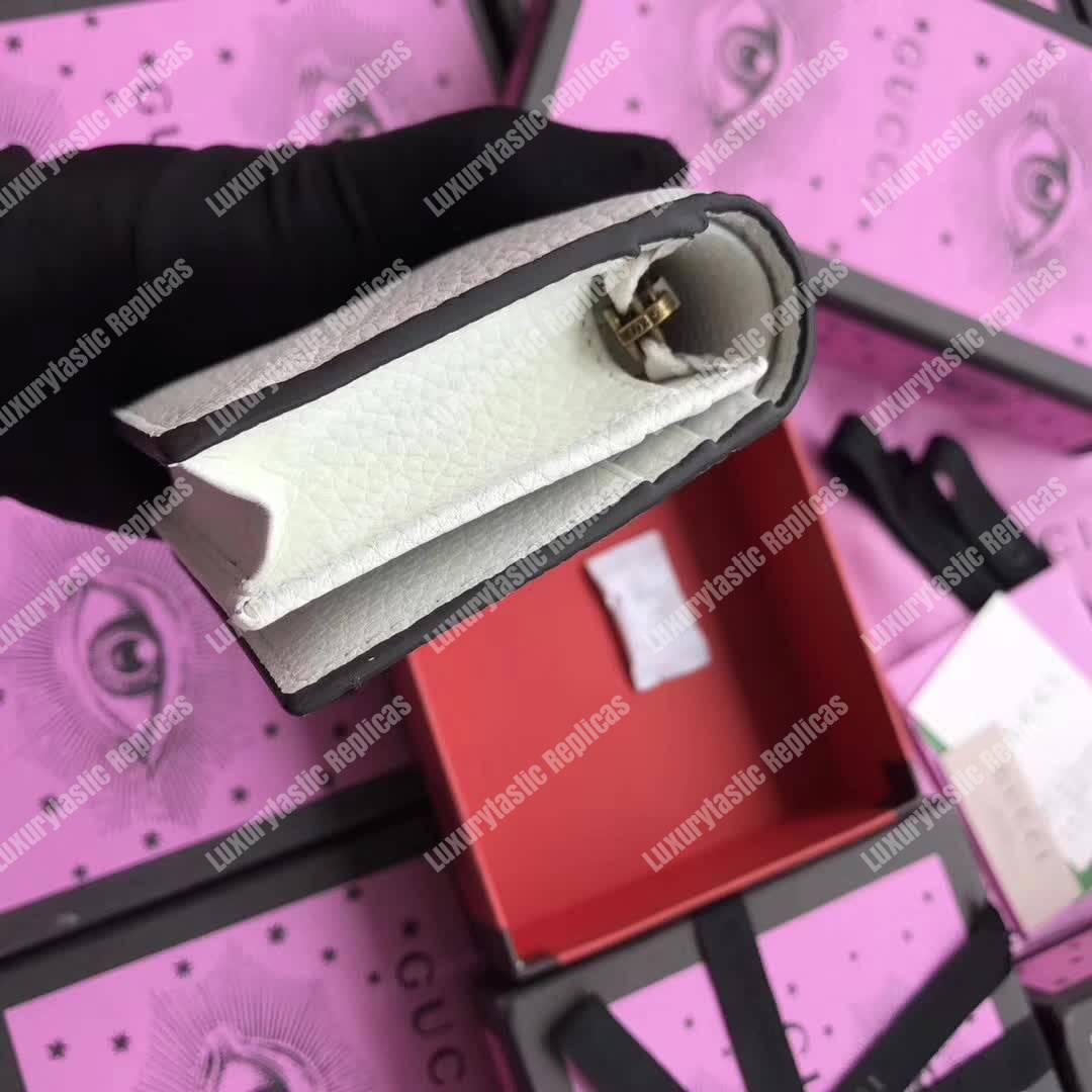 G*u*i animalier card case white with bee