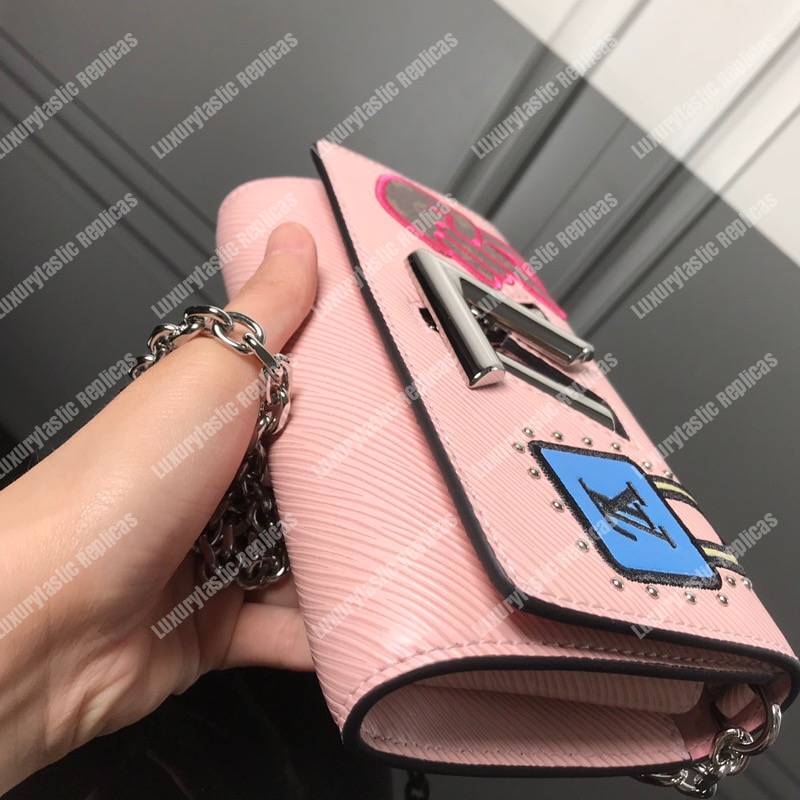 LV Twist Chain Wallet Epi Leather Travel and Trunk-Making Heritage Pink