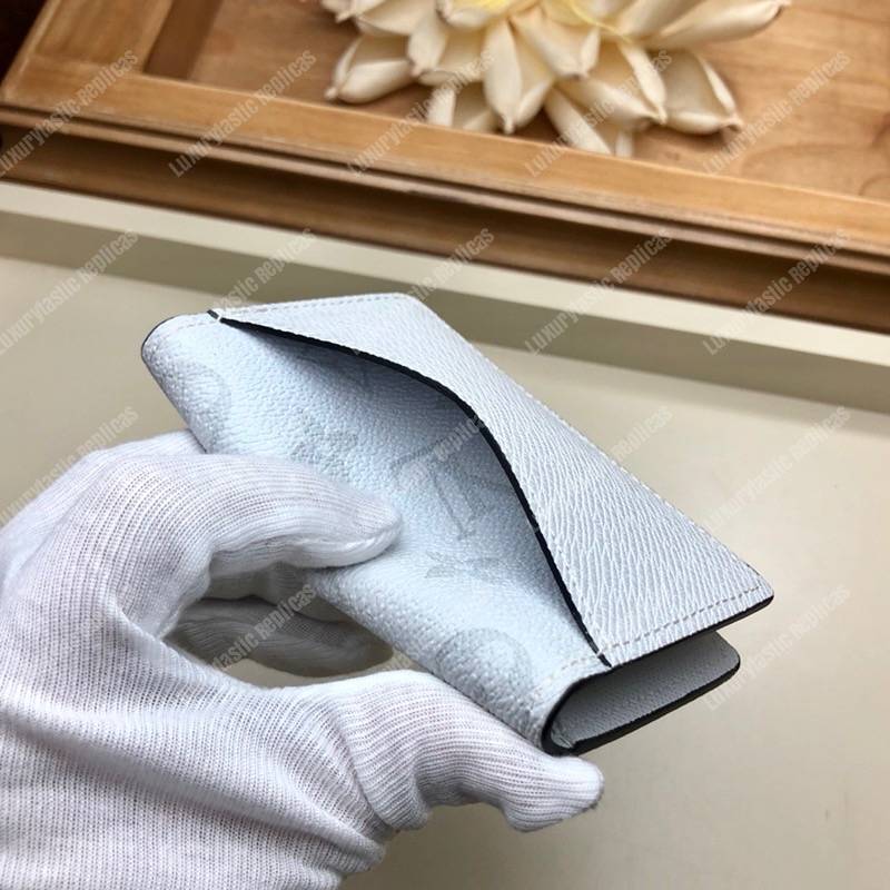 LV Pocket Organiser K45 Taiga Monogram White