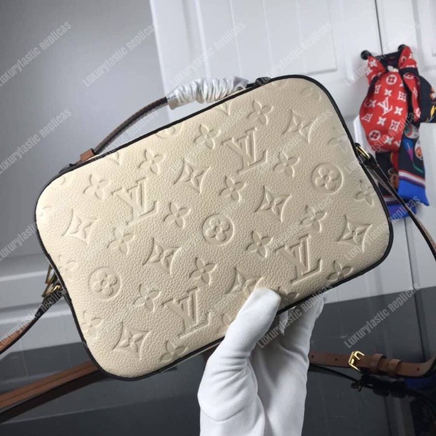 LV Saintonge Monogram Empreinte Leather Creme Caramel