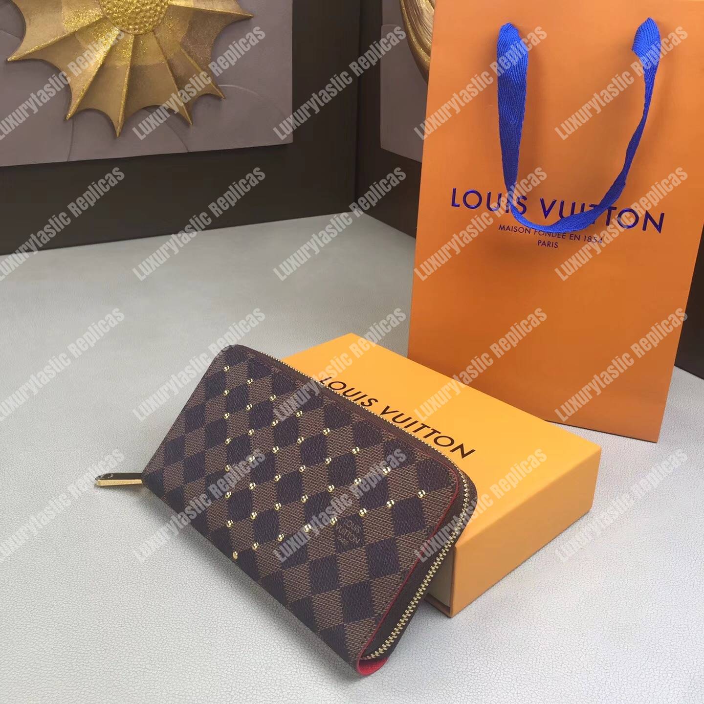LV Zippy Wallet Damier Ebene Gold Studs