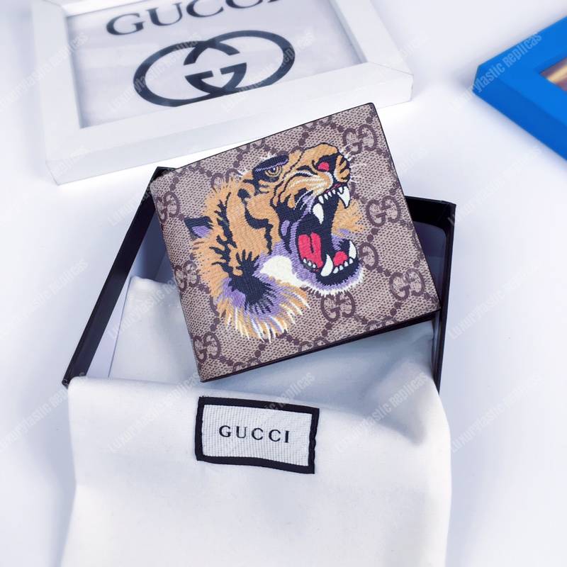 G*u*i tiger print gg sup*e wallet