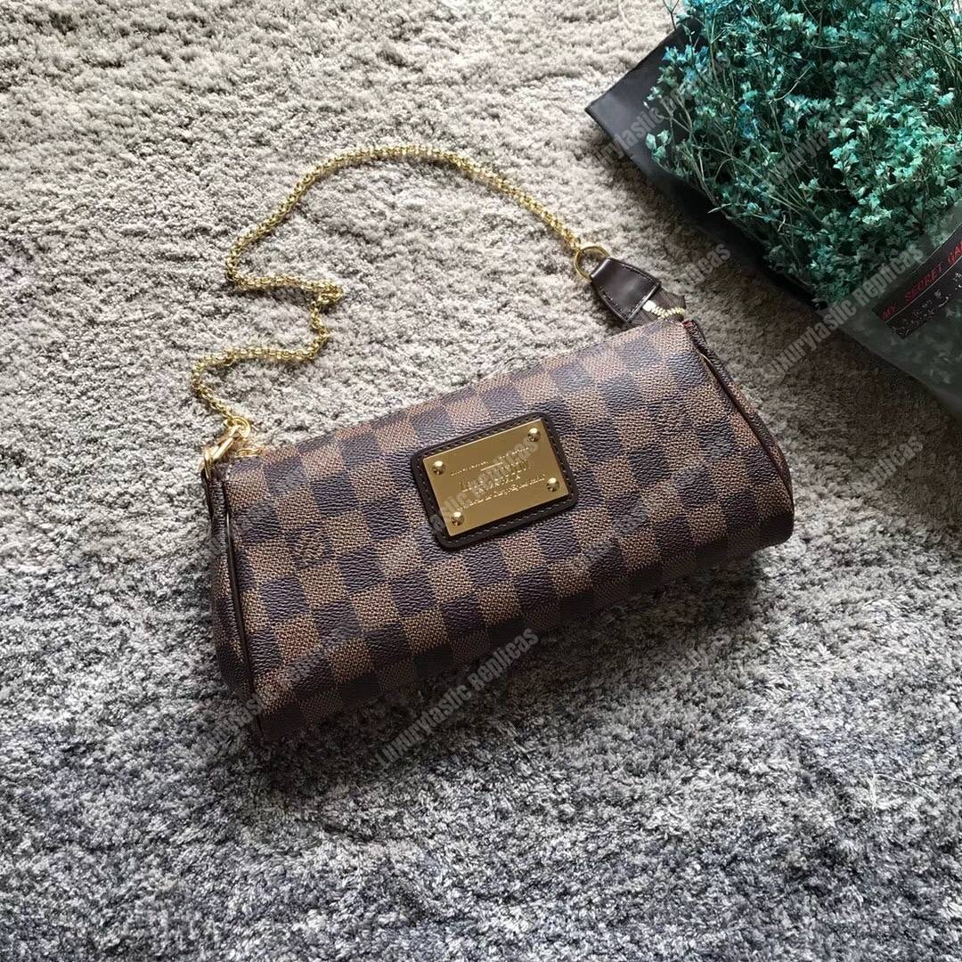 LV Eva Clutch Damier Ebene Canvas