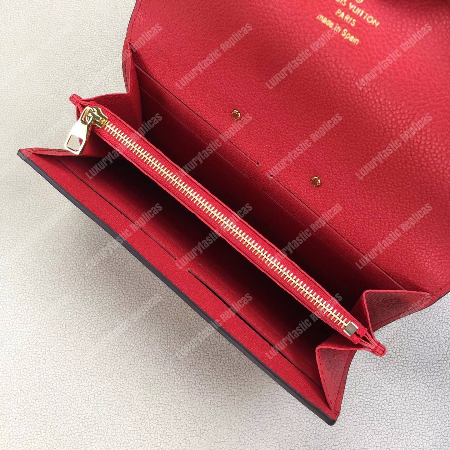 LV Metis Wallet Monogram Empreinte Leather Scarlet