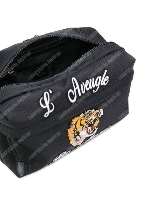 G*u*i embroidered tech pack belt bag tiger