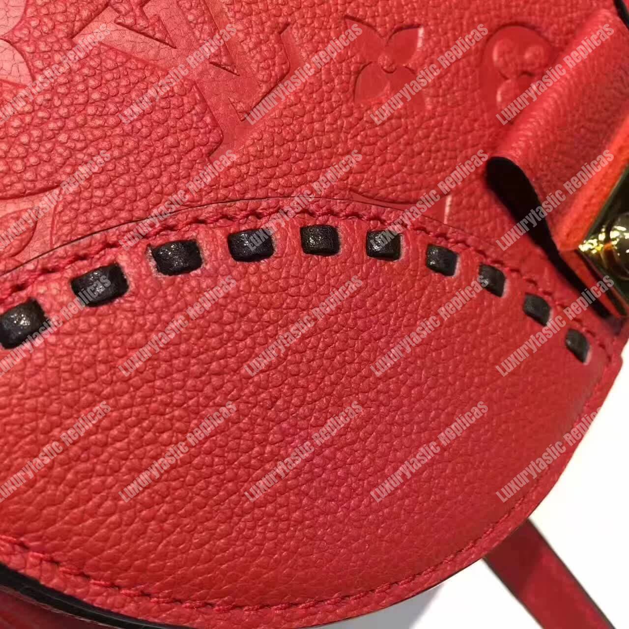 LV Junot Monogram Empreinte Leather Cerise